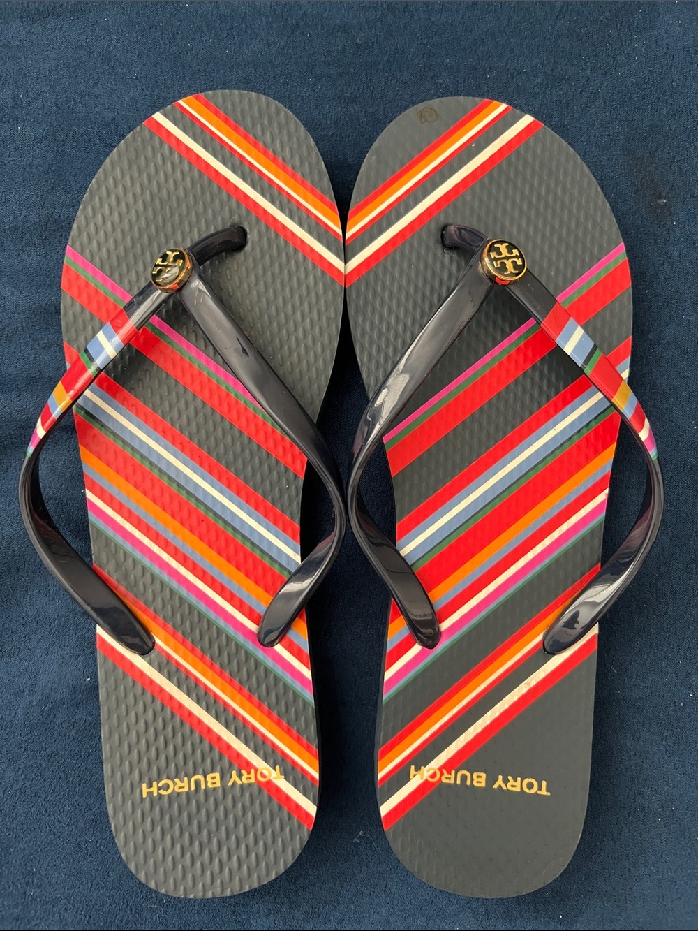 Tory Burch Black Flip Flops with Red, Orange & Pink Stripes